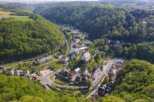 View of the town from the north with mountain church, castle ruins and buildings of the TU Dresden in the valley of the Wilde Weißeritz, Tharandt, Saxony, Germany, Europe