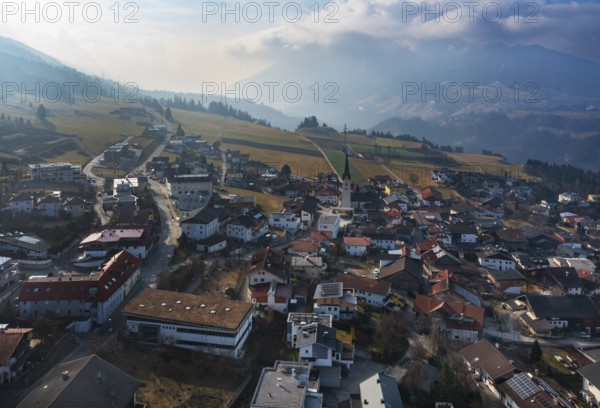 Drone image, view of the village with parish church, Patsch, Tyrol, Austria, Europe