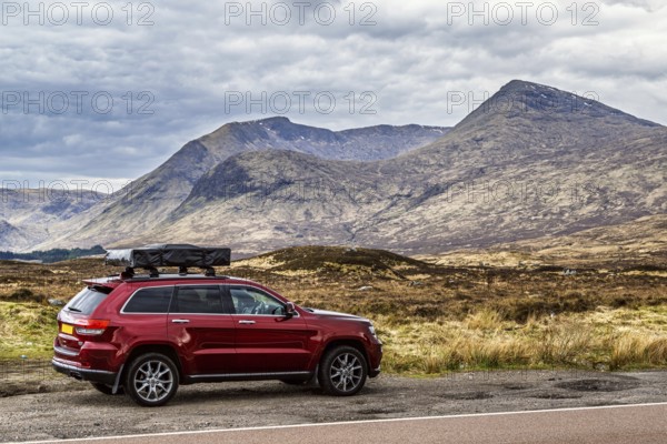 4x4 cars in Glen Etive Valley, Highlands, Scotland, UK
