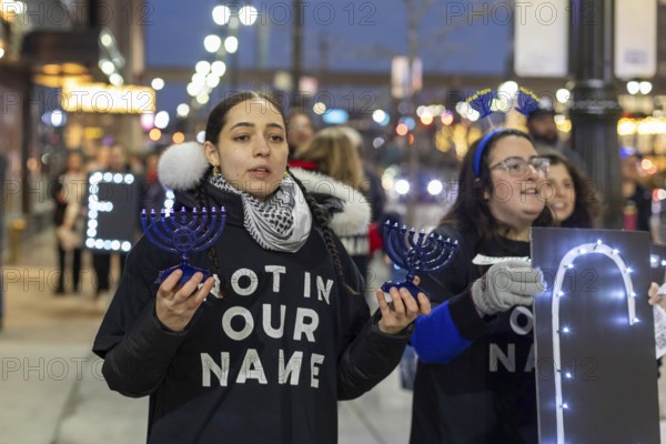 Detroit, Michigan USA, 7 December 2023, On the first night of Hanukkah, Jews for Ceasefire carried menorahs, calling for a ceasefire in the fighting in Gaza