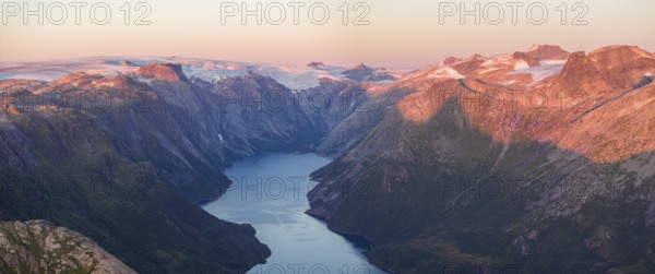 View from Seiskallåfjellet into the Nordfjorden, evening mood, Svartisen Glacier in the background, Saltfjellet Svartisen National Park, Helgeland Coast, Rødøy, Nordland, Norway, Europe