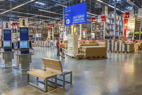 Customers inside warehouse area of IKEA home store