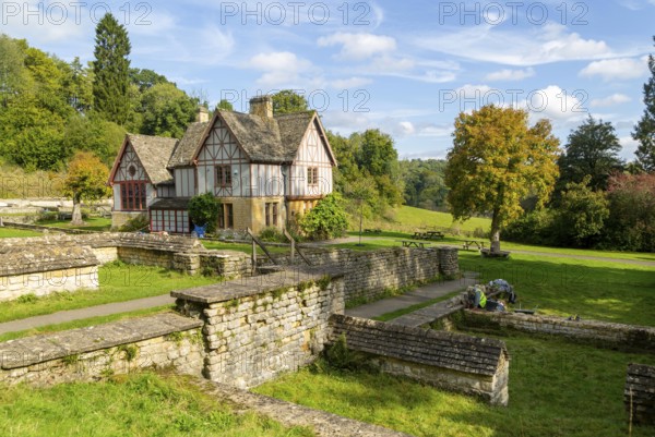 Overview of excavated walls and museum building, Chedworth Roman Villa, Chedworth, Cotswolds, Gloucestershire, England, UK