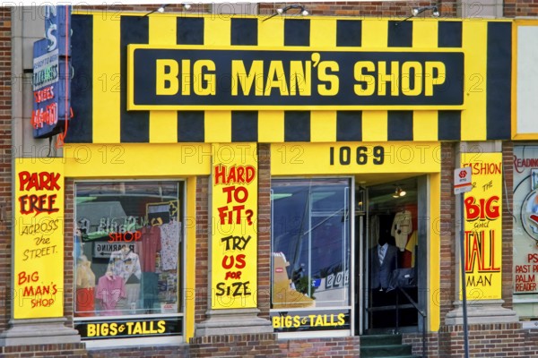 Facade of a plus size shop with eye-catching yellow and black neon sign, Big Man's Shop, retail, specialty clothing shop, men, overweight, obesity, Los Angeles, USA, North America