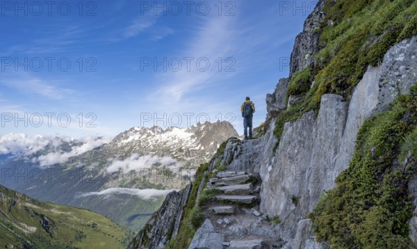 Mountaineer on a hiking trail, view of mountain panorama, Chamonix, Haute-Savoie, France, Europe