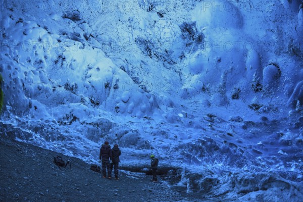 Tourists inside an ice cave, glacier cave, Vatnajökull, Iceland, Europe