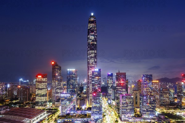 Shenzhen skyline with skyscrapers city centre downtown at night in Shenzhen, China, Asia