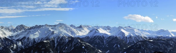 Alpine panorama with snow-covered mountain peaks in winter. Taken in the ski resort of Serfaus Fiss Ladis (Tyrol, Austria)