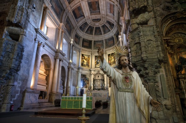 Interior view, statue of a saint, choir, altar, monastery church Igreja Santa Maria de Belém, Hieronymite monastery Mosteiro dos Jerónimos, also Mosteiro de Belém, Belém, Lisbon, Portugal, Europe