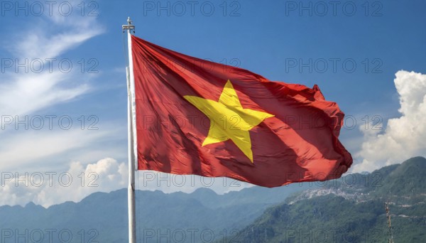 Flags, the national flag of Vietnam flutters in the wind