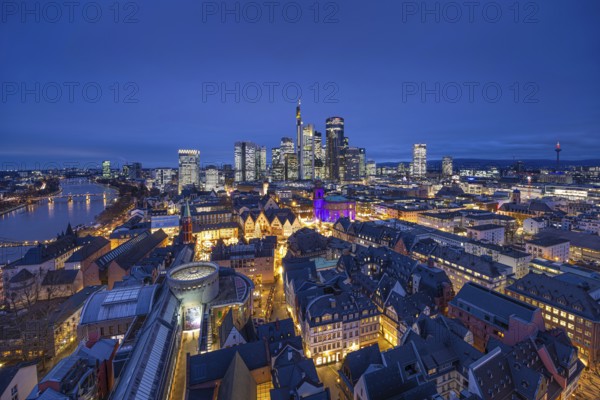 St Paul's Church in Frankfurt am Main will be illuminated in blue in the middle of the Christmas market on 10 December 2024, International Human Rights Day. This commemorates the declaration of the UN Human Rights Charter of 10 December 1948. Frankfurt am Main, Römerberg, Hesse, Germany, Europe