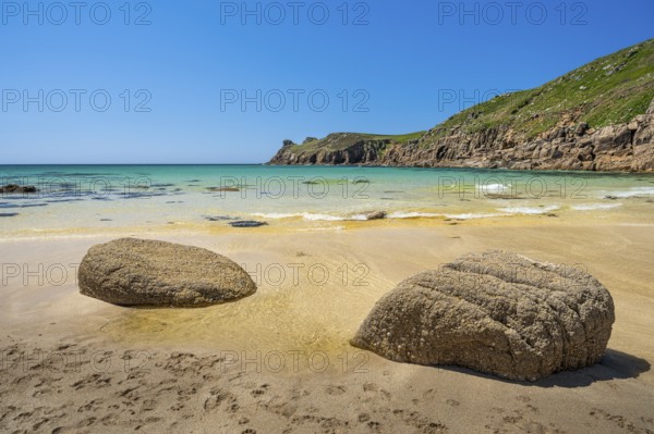 Sandy beach beach and rocks in Nanjizal Bay or Nanjizal Beach. St Just, Penzance, Cornwall, England, Great Britain