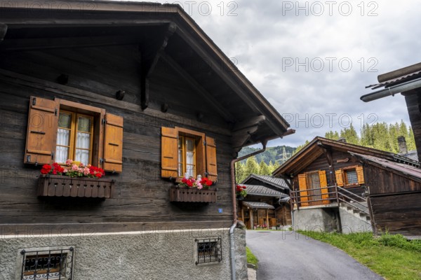 Traditional wooden houses in the mountain village of Fionnay, Val de Bagnes, Valais, Western Alps, Switzerland, Europe