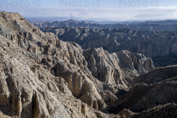 Wide hilly desert landscape with dry vegetation, Gorafe desert, semi-desert, Granada, Andalusia, Spain, Europe