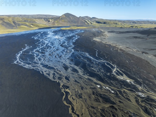 Aerial view, glaicial streams flow across Mælifellssandur, black sand desert, Icelandic highlands, Iceland, Europe