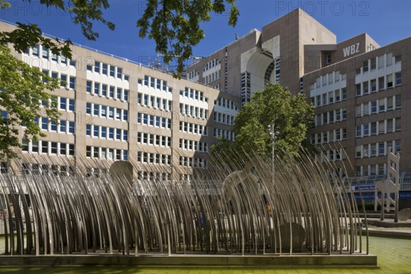 Stainless steel figure group on Bertha-von-Suttner-Platz entitled The Island by Horst Antes, Düsseldorf, North Rhine-Westphalia, Germany, Europe