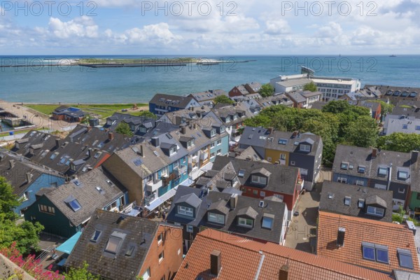 View of the Unterland and the dune from the Oberland Promenade, colourful houses, architecture, roof gables, roofs, trees, horizon, offshore island of Heligoland, North Sea, Pinneberg district, Schleswig-Holstein, Germany, Europe