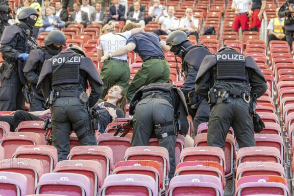 Baden-Württemberg police anti-terror exercise in the stadium. In the run-up to the European Football Championships, 1200 police officers rehearse for an emergency. Scenario: stabbing in the stands of the MHP Arena, VfB Stuttgart's stadium, which is also the venue for five European Championship matches. After initial treatment by the police, the handover of the injured to the emergency services and fire brigade was also rehearsed. Stuttgart, Baden-Württemberg, Germany, Europe