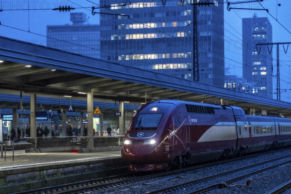 Eurostar train, train traffic, city centre skyline, Essen central station, North Rhine-Westphalia, Germany, Europe