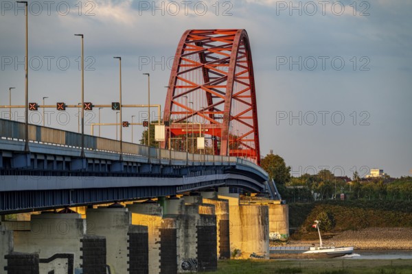 The Bridge of Solidarity, the longest tied-arch bridge in Germany, over the Rhine from Duisburg-Hochfeld to DU-Rheinhausen, the road bridge is dilapidated and has to be rebuilt, many thousands of lorries from the Logport port and cars use the bridge every day, new construction by 2040, Duisburg, North Rhine-Westphalia, Germany, Europe