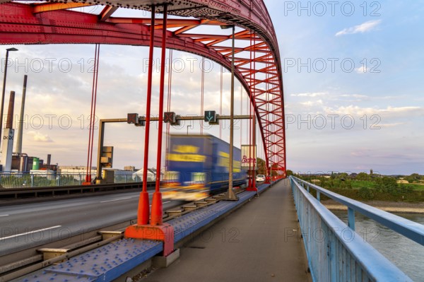 The Bridge of Solidarity, the longest tied-arch bridge in Germany, over the Rhine from Duisburg-Hochfeld to DU-Rheinhausen, the road bridge is dilapidated and has to be rebuilt, many thousands of lorries from the Logport port and cars use the bridge every day, new construction by 2040, Duisburg, North Rhine-Westphalia, Germany, Europe