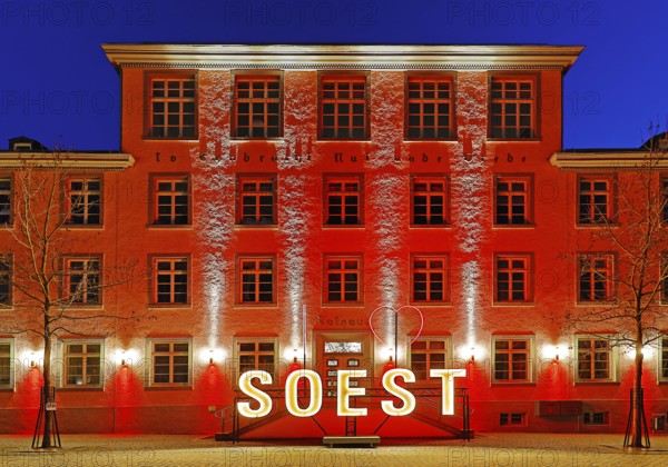 Illuminated town hall in the evening at the Winterstrahlen Festival of Lights in Soest, North Rhine-Westphalia, Germany, Europe
