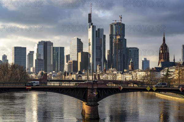 Skyline of the city centre of Frankfurt am Main, river Main, Ignatz-Bubis-Bridge, dusk, Hesse, Germany, Europe