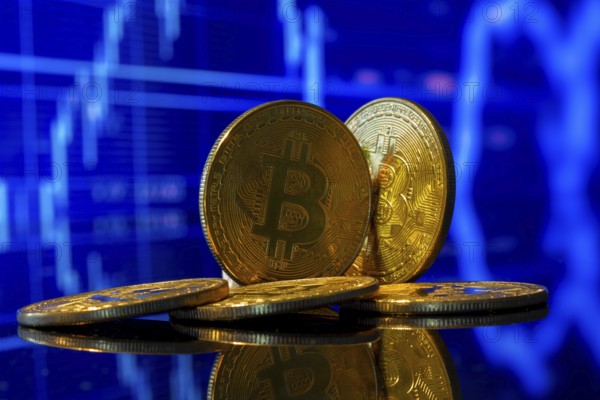 Close-up of symbolic bitcoins