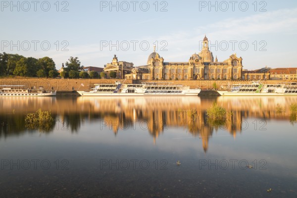 Silhouette of the Old Town with reflection in the Elbe in the morning, steamboats on the Terrassenufer, Brühl's Terrace, Academy of Fine Arts and Church of Our Lady, Dresden, Saxony, Germany, Europe