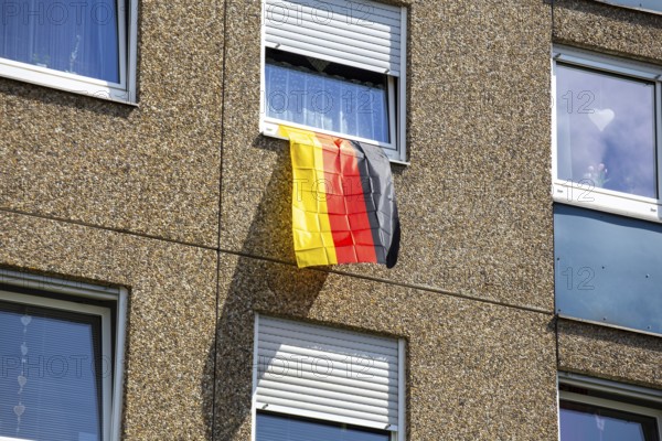 German flag on a high-rise window in the run-up to the upcoming European Football Championship in Germany flag