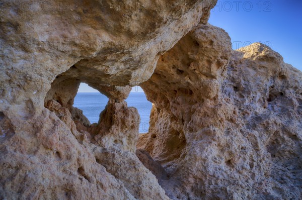Eyes, Algar Seco rock formation, coloured rocks and underground caves, caves, shell limestone, Carvoeiro, Algarve, Portugal, Europe