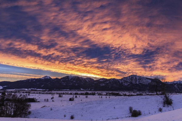 Dawn, clouds over mountains, winter, snow, Loisach-Lake Kochel moor, Kochler mountains behind, Bavaria, Germany, Europe
