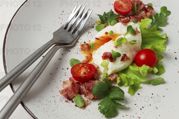 Poached egg, with bacon and vegetables, breakfast, homemade