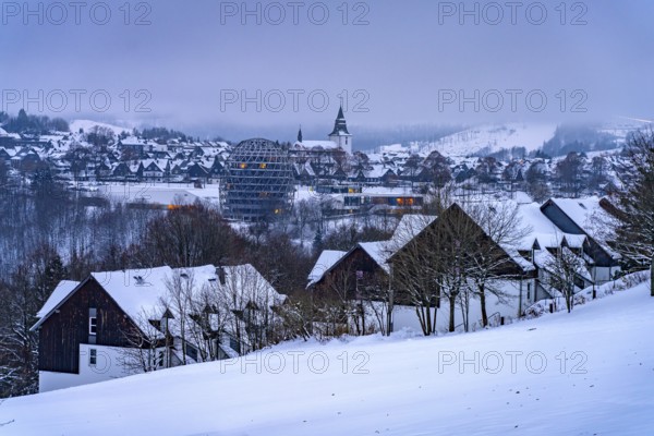 The snow-covered town view of Winterberg at dusk, Sauerland, North Rhine-Westphalia, Germany, Europe