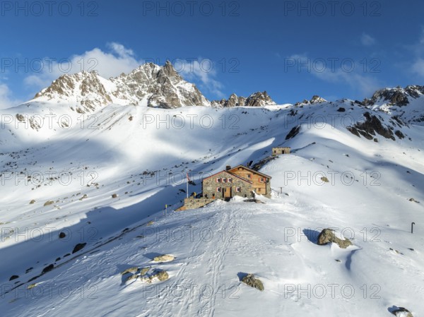 SAC Alpine Club hut in winter, Chamanna d'Es-cha, Pitz Blaisun, Albula Alps, Grisons, Switzerland, Europe