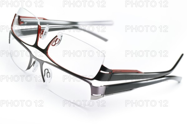 Two stylish glasses from JAGUAR on a white background, studio shot