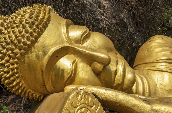 Reclining Buddha statue, Phousi or Phu Si Hill, Luang Prabang, Laos, Asia