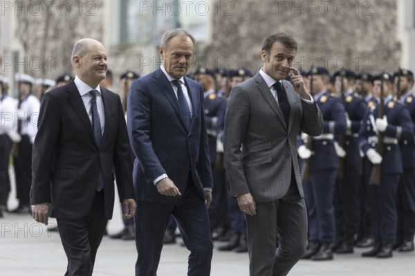 Federal Chancellor Olaf Scholz (SPD) welcomes Emmanuel Macron, President of France, and Donald Tusk, Prime Minister of Poland, to the Federal Chancellery with military honours in Berlin, 15.03.2024