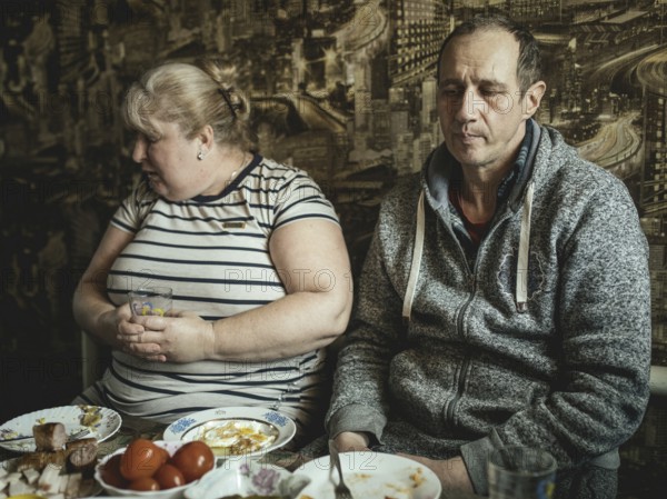 Ira and Mischa. Their house is now home to 13 people, their own family and refugees they have taken in, Voloska Balakliia, 2024, Ukraine, Europe