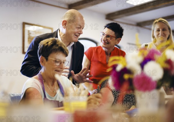 Federal Chancellor Olaf Scholz, (SPD), photographed during a visit to the Alte Dampfbaeckerei in Seelow, on the occasion of his summer tour. 29.08.2024