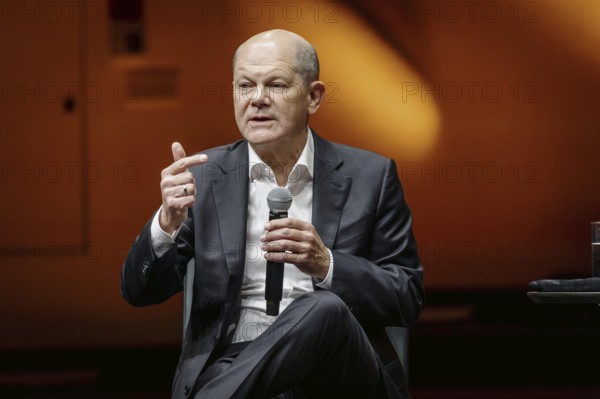 Discussion panel Olaf Scholz (SPD), Federal Chancellor, with author Juli Zeh (not pictured) in Potsdam, 30 January 2024