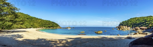 Panoramic image of the paradisiacal beach of Indaiauba on the island of Ilhabela, Indaiauba beach, Ilhabela, Sao Paulo, Brazil, South America