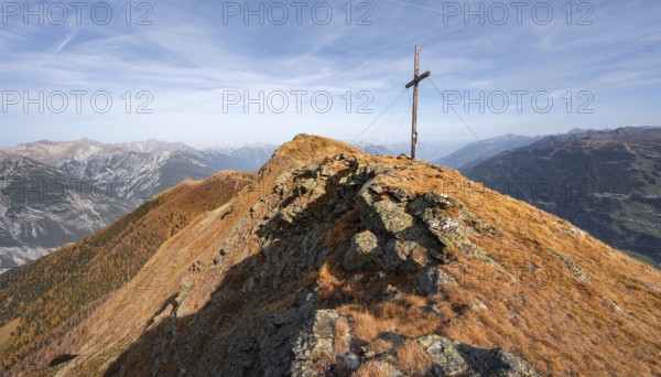 Summit cross on the ridge of the Venet, in autumn, Venet crossing, Ötztal Alps, Tyrol, Austria, Europe