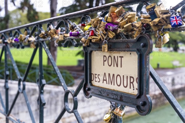 Bridge of love at waterfront of city of Annecy, Departement Haute-Savoie, region Auvergne-Rhône-Alpes, France, Europe