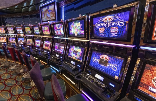 Seattle, USA, 18 September 2022: Casino gambling blackjack and slot machines waiting for gamblers and tourist to spend money, North America