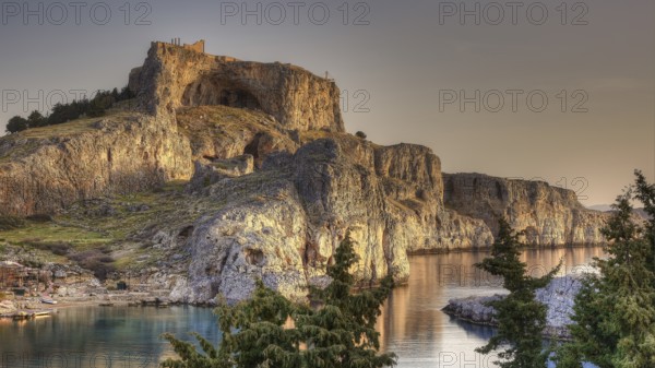 Early morning light, Acropolis of Lindos, Bay of St Paul, Lindos, Rhodes, Dodecanese, Greek Islands, Greece, Europe