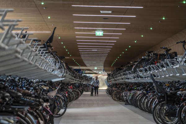 New bicycle car park at Amsterdam Central Station, IJboulevard, space for around 4000 bicycles, digitally monitored, underground, direct connection to the station, built into the water of the IJ, at the back of the station, Netherlands