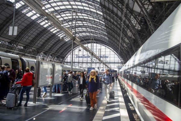 04 June 2024: Frankfurt Central Station with stopping ICE trains and lots of passenger traffic