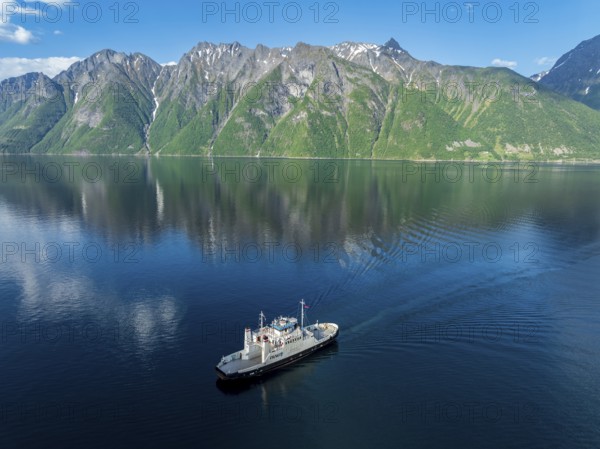 Ferry Trandal-Standal arrives at Standal, aerial view, fjord Hjoerundfjord, Norway, Europe
