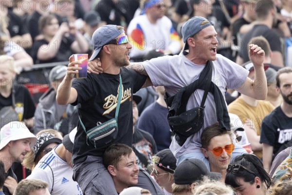Adenau, Germany, 8 June 2024: Fans listen to the band Donots at Rock am Ring. The festival takes place at the Nürburgring race track near the town of Adenau from 7 to 9 June 2024, Europe